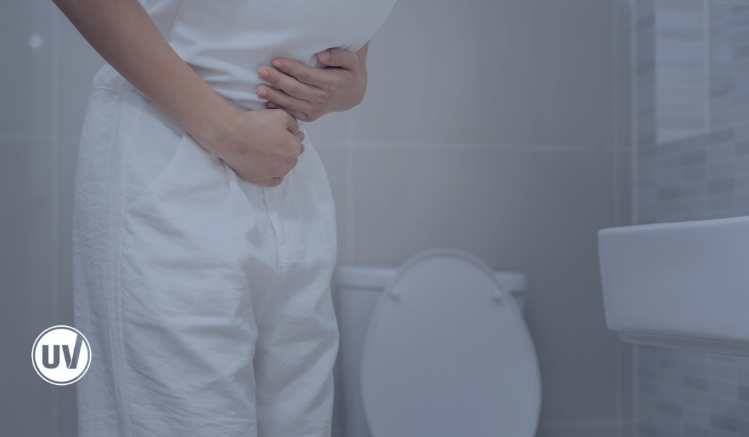 Woman rushing to the bathroom from fibroids pressing on her bladder