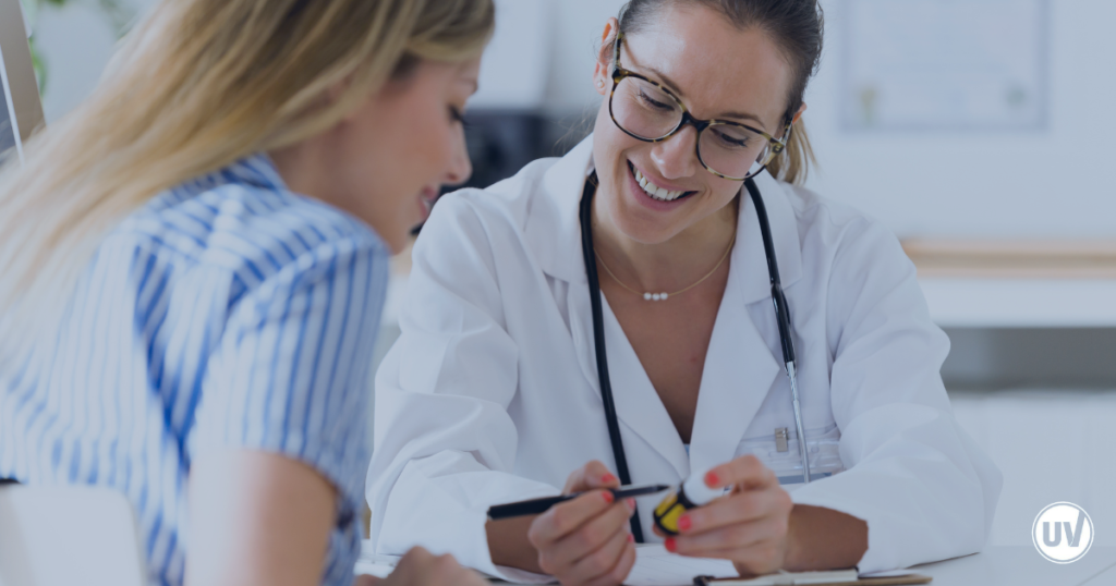 Vascular specialist explaining types of fibroids to patient