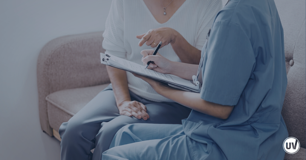 Woman discussing fibroid pain symptoms with fibroid specialist
