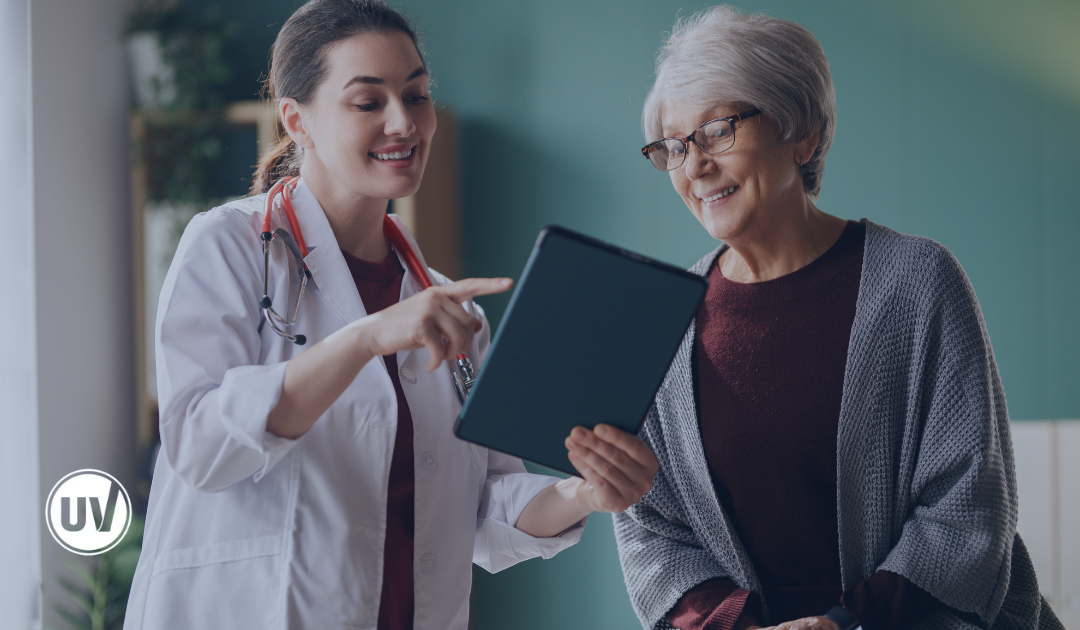 Fibroid specialist discussing fibroid symptoms with patient